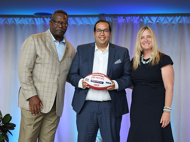 Kraft Family, Patriots Foundation and Gillette Present Ciro Valiente, First Literacy Board Member, With $10,000 Donation for First Literacy